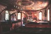 Kyrkorummet med koret i fonden. Foto från väster.