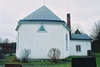 Håcksviks kyrka med sakristia vidbyggd i norr sedd från öster.