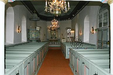 Långhuset i Öxnevalla kyrka sett mot koret, från V.