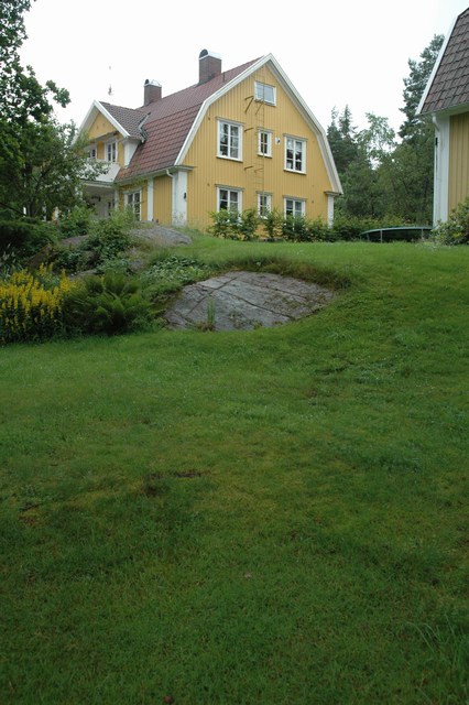 Västergärdet på Olidan: De två trähusen utanför byggnadsminnet. Till höger hörnet av det nordöstra huset.