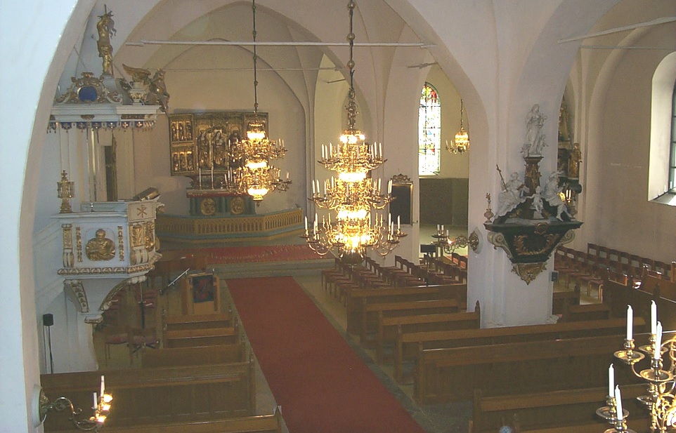 Interiör, kyrkorummet med bänkrader, altargång, predikstol, kor och altare. 
Bilden är tagen från orgelläktaren mot nordost. 