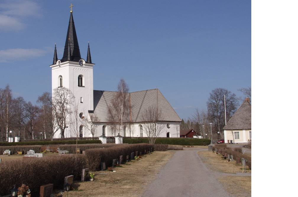 Svärdsjö kyrka med nya kyrkogården sedd från sydväst.