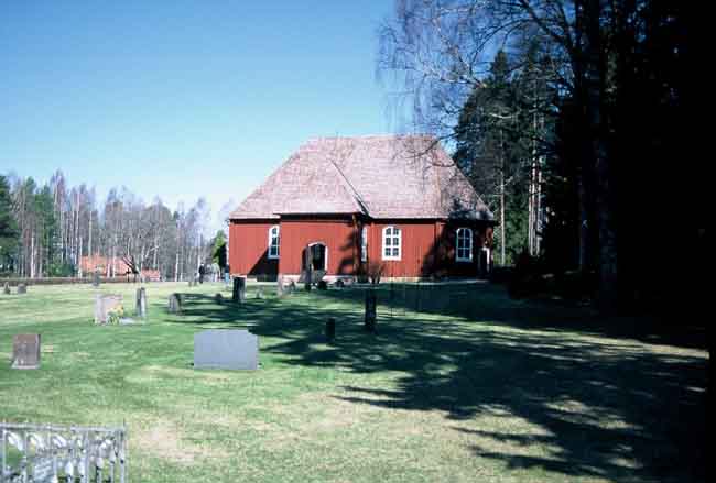 Kyrkan och kyrkogården från s.