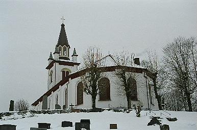 Fotskäls kyrka med omgivande kyrkogård, från SÖ.