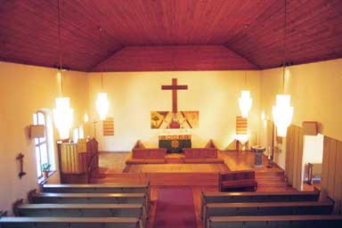 Kyrkorummet i Limmareds kyrka sett från läktaren, från V.

