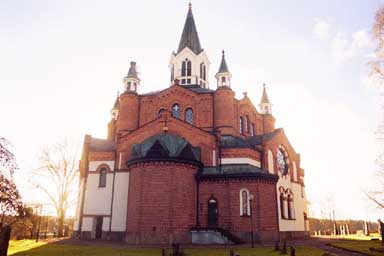 Tranemo kyrka sedd från norr med absid och sakristia tillbyggd på 1930-talet.
