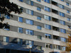 Del av fasad mot parkering. Ädelputsen har en inblandningen av glimmer. SAK00174 Stockholm, Bredäng, Par Bricole 1 Bredängsvägen 228-248 N 9910 JST