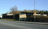 Sätra, Isätra 2, Eksätravägen 411-429.

Fotografi från väster av garagelängorna i områdets sydvästra del
