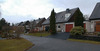 Framför husen finns små förgårdar och garageuppfarter.

SAK01409 Stockholm, Sätra, Örnsätra 66, Örnsätrabacken 42,_från sydost 




