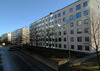 Skärholmen, Måsholmen 5, Äspholmsvägen 2-24.Vy från öster av byggnaderna norr om Äspholmsvägen, kvarteret Harholmen 3. Fasaderna och balkongfronterna är ommålade. 