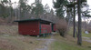 SAK00330 Stockholm, Bredäng, Sätra 2:1 från nordost Invid Mälaren i norr finns ett stort friluftsområde. På bilden omklädningshytter i sluttningen ner mot Mälarhöjdsbadet