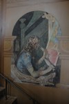 "Brytningstidens kvinna" målning i Carl Larssons svit "Den svenska kvinnan genom seklen": Vävstolens utsmyckning symboliserar asatron, kristendomen symboliseras av ängeln i vävnaden.
