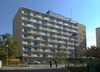 Kista stadsdelsnämnd i Husby centrum. Byggnaden innehöll ursprungligen kategoribostäder. SAK10374 Sthlm, Husby, Bergen 1, Ålesund 1, från N