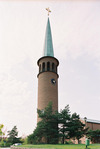 Essinge kyrka, exteriör med klocktornet från sydost. 
