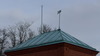 Utledningstornet har ett valmat sadeltak klätt med falsad skivplåt och profilerad takfot. Torntaket är krönt av en kraftsymbol samt av en vindflöjel med årtalet 1903. 